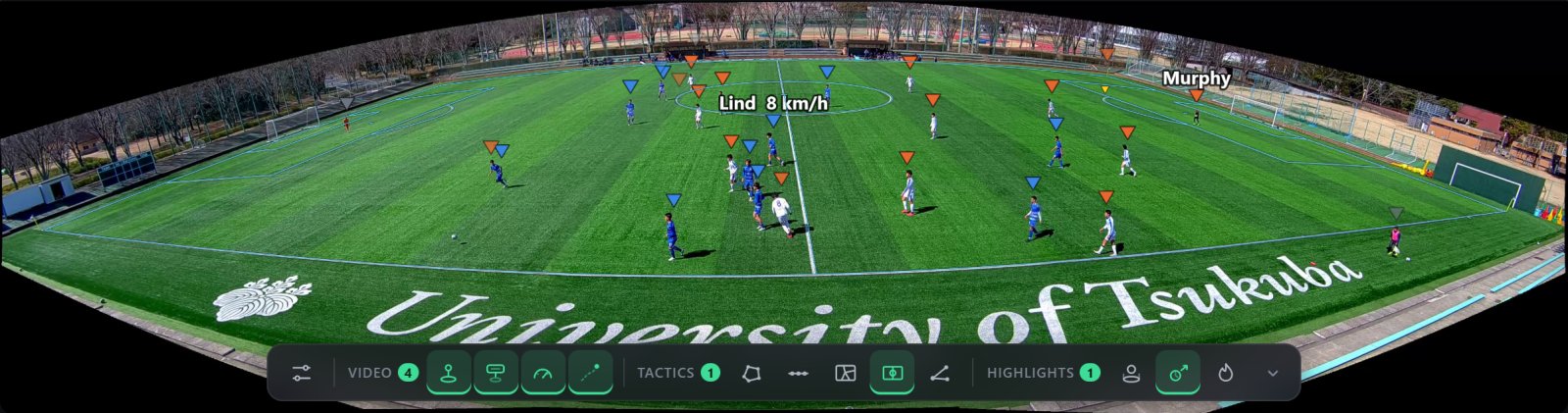 The SeeKick viewer: a match with every player marked by team, two of them named, and the view switches under the picture